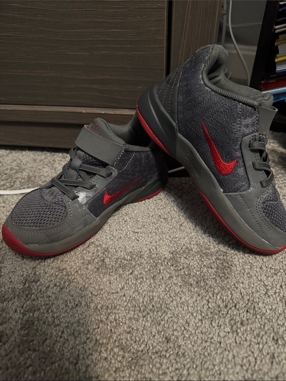 Nike Kids Gray Sneakers with Red Outsole Accent